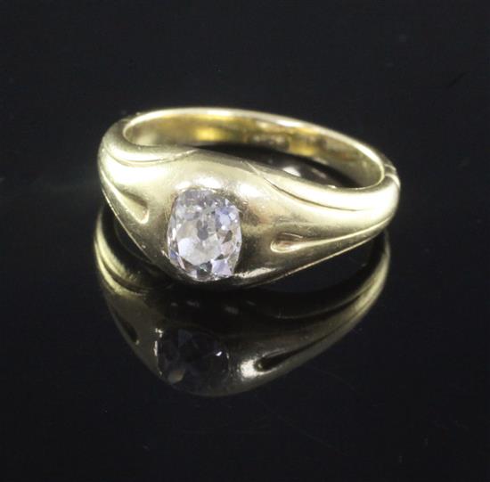 A gold and old oval cut collet set solitaire diamond ring, size M.